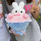 White bouquet rabbit plushie with pink accents, soft fabric texture.