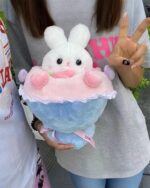 White bouquet rabbit plushie with pink accents, soft fabric texture.