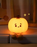 Pumpkin night light, a cute silicone lamp with glowing features and a smiling face.