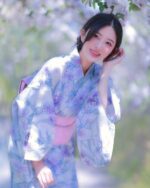 A woman wearing a pastel japanese yukata with floral pattern, Japanese Aesthetic.