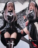 Vampire nun cosplay featuring two models in a black and white outfit with a cross emblem.
