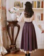 Back view of a French-Style Double Layer Dress - Cottagecore aesthetic dress, featuring a cream blouse and a purple midi skirt with lace trim.