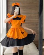 Orange and black cute halloween dress with pumpkin accents and matching headband.