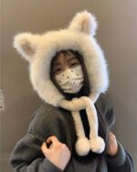 White fox ears hat with a hood and attached ears. A cozy plush hat.