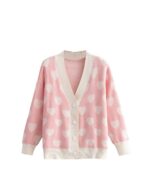 Pink kawaii knitted sweater with white heart pattern and button closure.