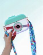 A teal kawaii camera bottle with a strap, showcasing a portable drinking container.
