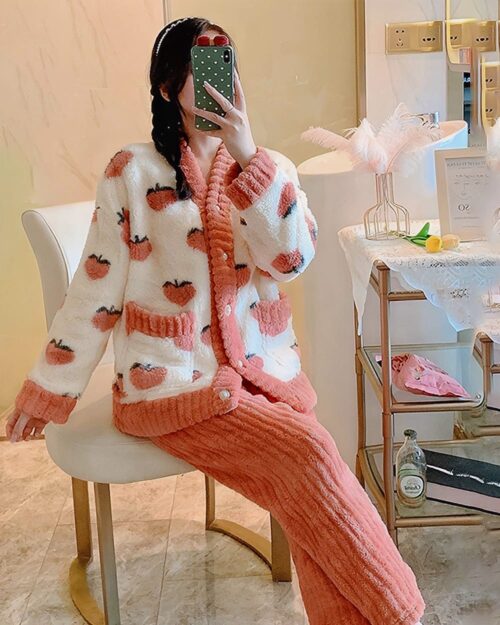 Pink and white kawaii strawberry pajamas with strawberry applique details. Comfortable homewear.