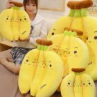 Set of three cute banana plushies, featuring smiling faces and plush construction.