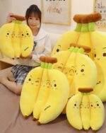Set of three cute banana plushies, featuring smiling faces and plush construction.