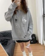 Gray cat paw hoodie featuring kawaii cat graphics and star accents. Harajuku aesthetic cat paw hoodie.