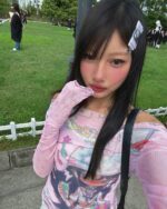 Retro pink cutecore top featuring a layered design and long sleeves.