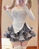 Y2k Lolita set featuring a white long-sleeved top and gray ruffled skirt.