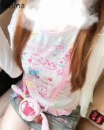 Kawaii Cake Shop Tee featuring cute cake and tea party illustrations on a pink and blue cotton blend.