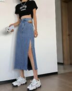 Light blue korean denim skirt with a side slit, casual style.