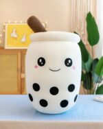 Cute boba milk tea plush toy, featuring black tapioca pearls and a straw.
