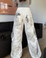 Washed out y2k artsy pants, wide-leg cargo style.
