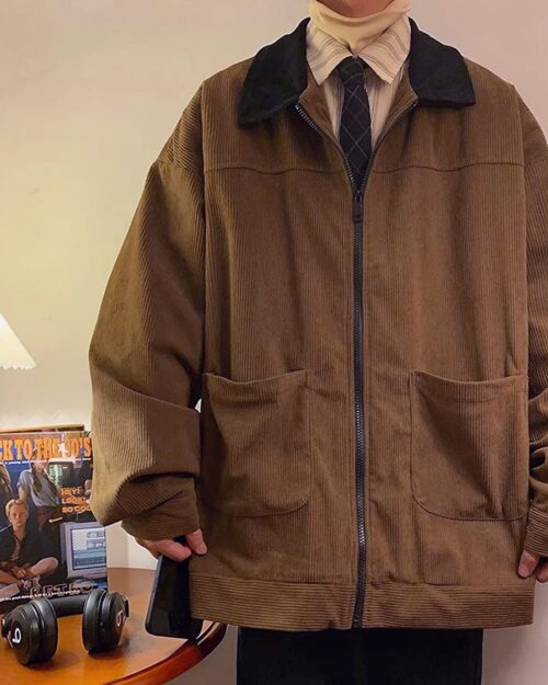 Close-up of a Korean college jacket, corduroy style with pockets and collar.