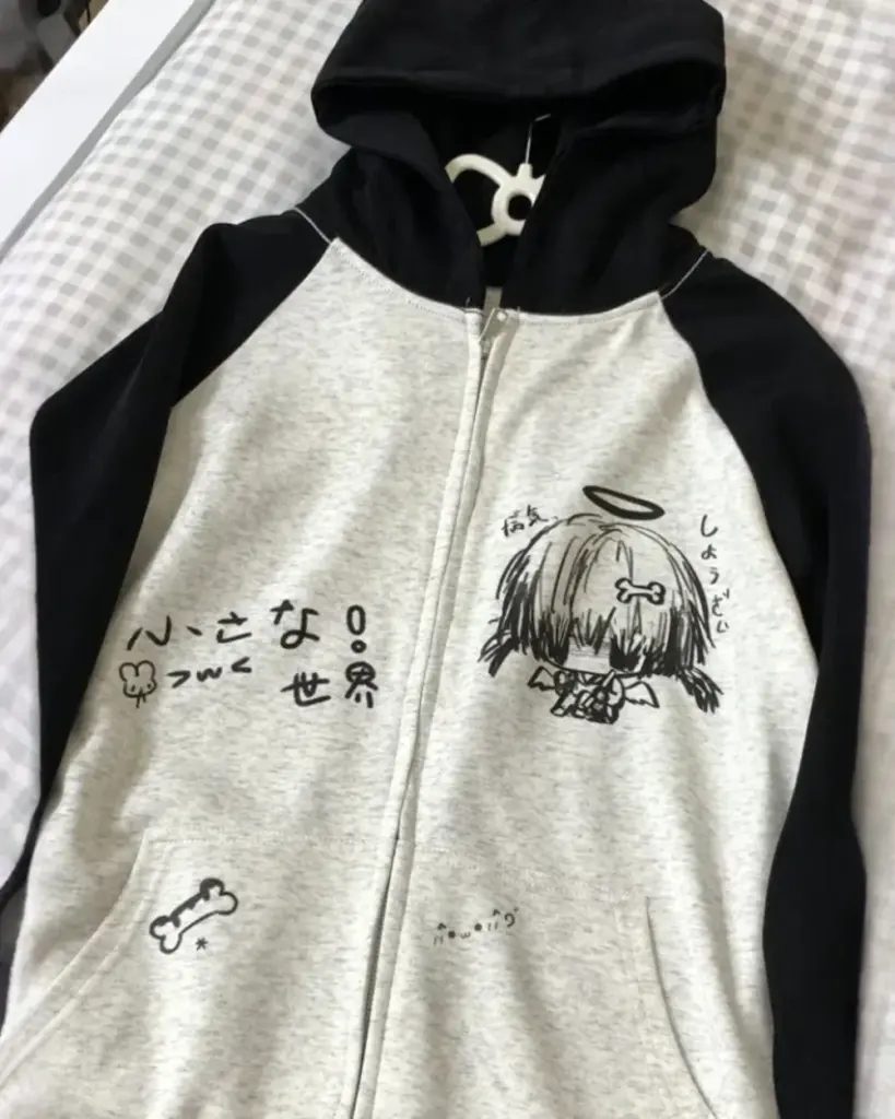 Black and White Cardigan Hoodie - Animecore Aesthetic with graphic prints and a zipper closure.