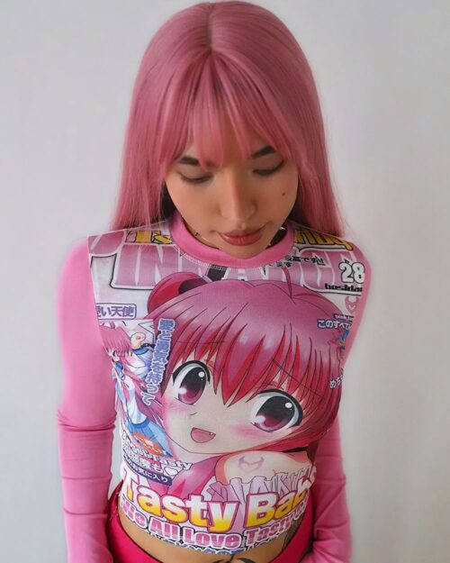 Y2k animecore shirt featuring anime-inspired graphics and a long sleeve design.