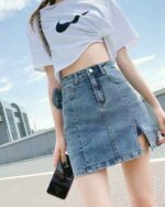 High Waist Denim Skirt - Y2K Aesthetic, showing a denim skirt with a split detail.