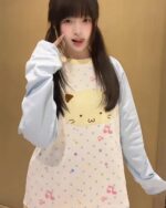 Harajuku cat sweatshirt featuring a cute cat design and pastel colors. Jojifuku aesthetic.