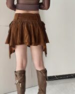Irregular brown aesthetic vintage skirt with ruffled details and a high waistline.