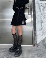 Kakkoi Style Pleated Set – Gothic Aesthetic: Black skirt and top outfit with lace socks and platform boots.