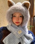 Person wearing a fluffy gray fox ear beanie, Kawaii Clothes winter hat.