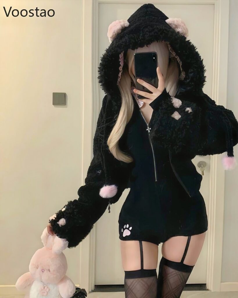 Black cat jumpsuit set featuring a hooded coat and matching dress, complete with cat ear accents.