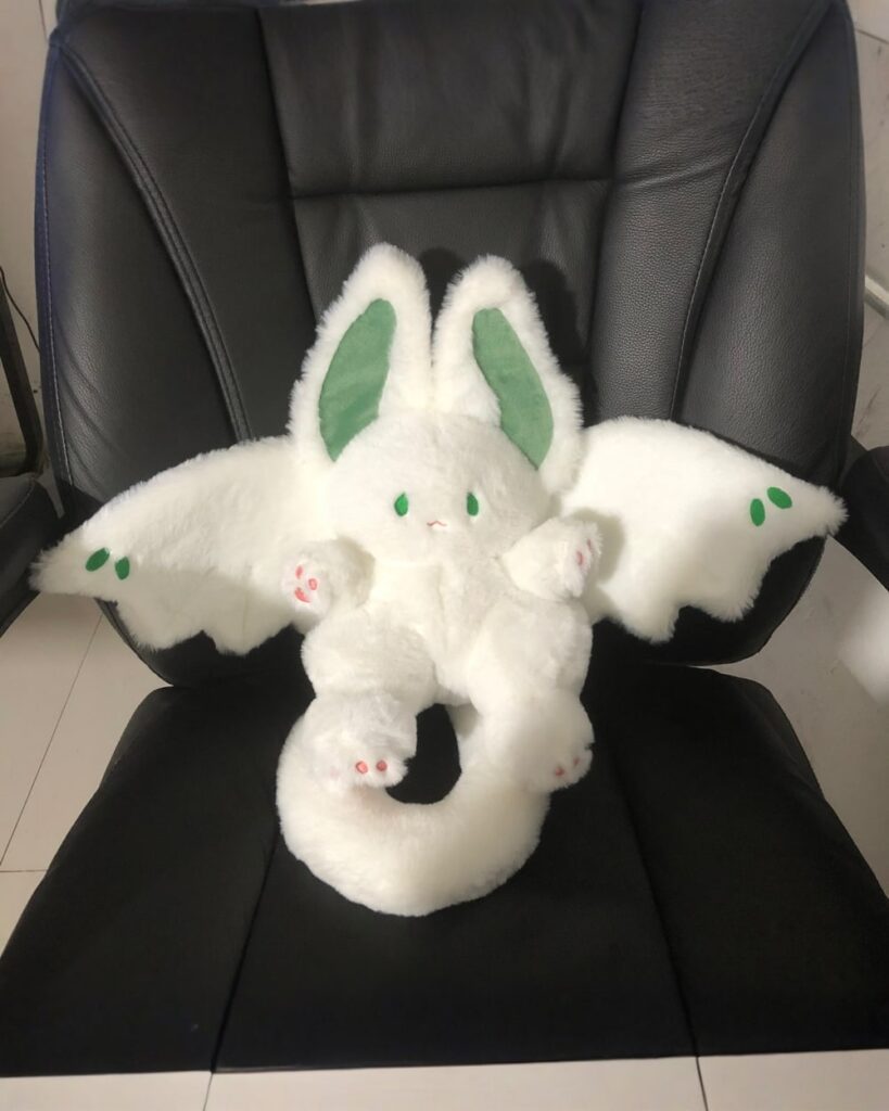 Kawaii Moonlight the Bat Rabbit Plushie, aesthetic plushies sitting on a chair.