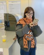 Cartoon animal scarf featuring tiger and fox patterns, an animal winter scarf.