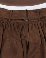 Irregular aesthetic vintage skirt in brown suede, featuring a belt and pleats.