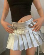 Silver pleated skirt with a metallic sheen and belt detail.