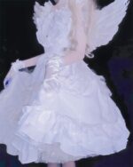 Detailed white gothic lolita dress with lace and ruffled layers, featuring angel wings.