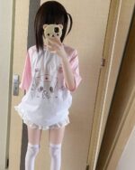 Neko nurse t-shirt featuring a cute bear nurse design, layered over a pink shirt.