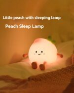Small peach night lamp, kawaii-style sleeping light with soft glow.