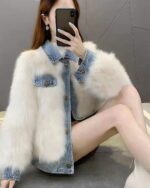 White faux fur jacket paired with a light wash y2k aesthetic denim coat.