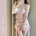 Four-piece kawaii aesthetic swimsuit with floral print bra and bottoms.