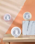 Two kawaii cat lamps displayed on a marble surface, body-activated night light.