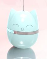 Cute kawaii cat toy, an automatic feather tumbler with a cat face design.