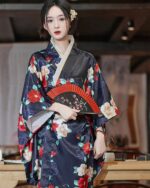 Satin-Fabric Light Kimono - Japanese Floral Design, featuring a woman wearing a floral kimono with a fan.