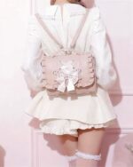Vegan Leather Lolita Bag - Jirai Kei Aesthetic backpack, pink, with bow detail.