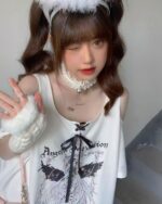 Model wearing a Dark Angel Oversized gothic lolita tee with butterfly graphic.
