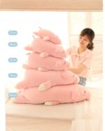 Stack of kawaii piggy plushies in various sizes, including 32cm, 45cm, 55cm, 70cm, and 85cm.