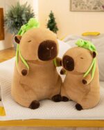 Brown capybara plush backpack with a turtle, displayed indoors.