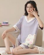 Purple kawaii bear pajamas set with shorts and a top featuring a cute bear design.