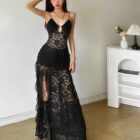 Black gothic aesthetic dress, featuring a lace design and a deep V-neck cutout.