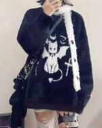 Black kawaii neko sweater with goth punk design featuring bats and stars.