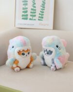 Kawaii Mango the Cosplay Cat Plushie - Shark Edition, two plush toys with shark designs in pastel colors.