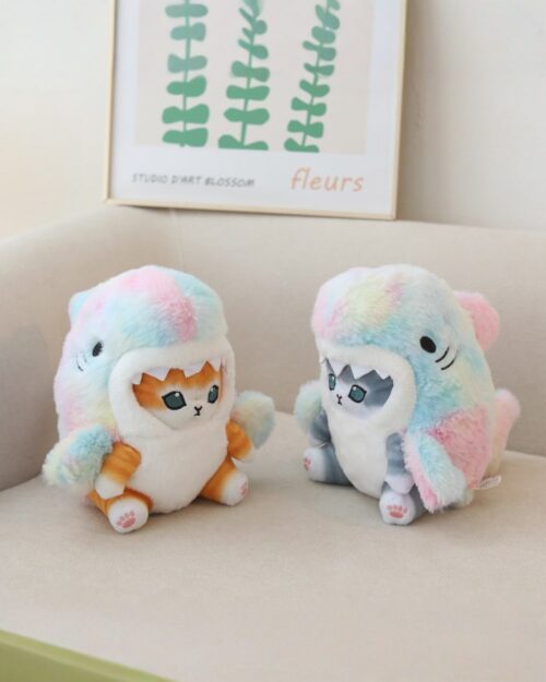 Kawaii Mango the Cosplay Cat Plushie - Shark Edition, two plush toys with shark designs in pastel colors.